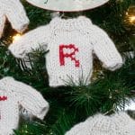 Tiny Knit Sweaters on a Christmas Tree.