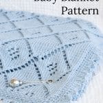 Blue Knit Lace Baby Blanket Pattern on white blanket.