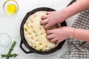 Sourdough Focaccia dough in greased cast iron pan.