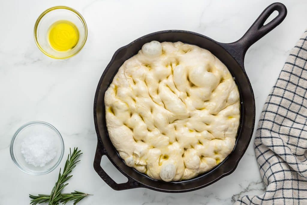 Sourdough Focaccia dough in greased cast iron pan.