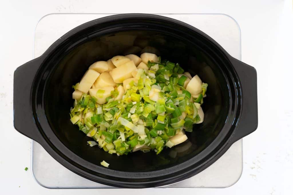 add leeks to potatoes to slow cooker