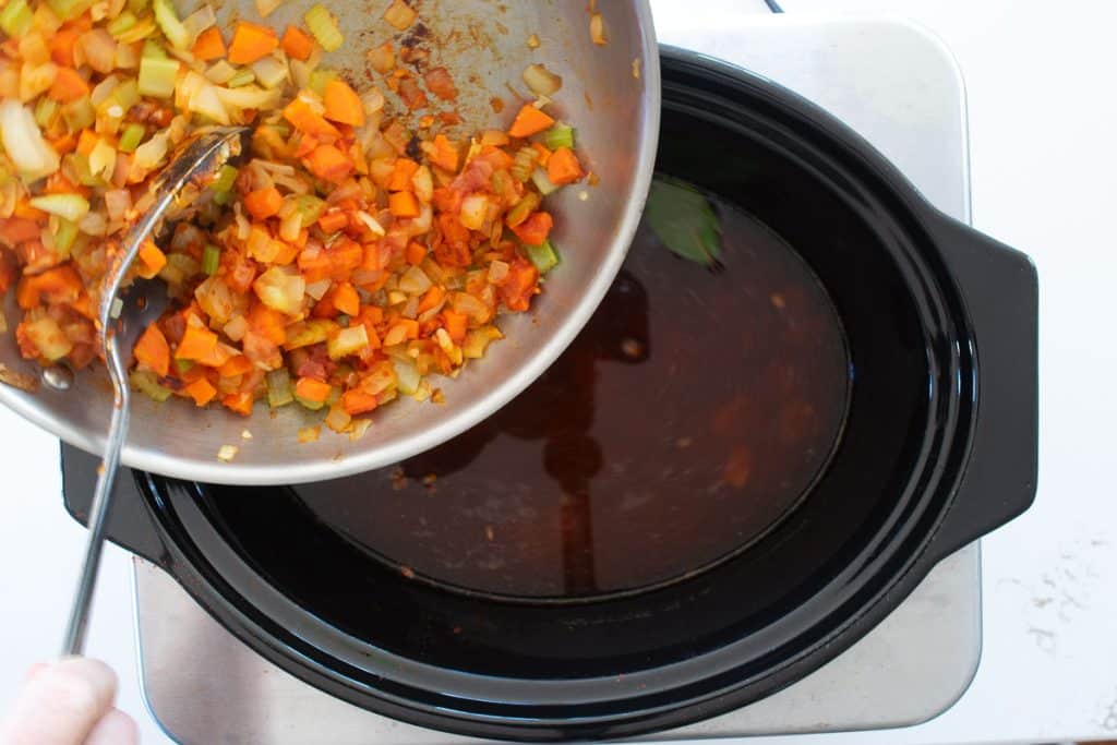 Add sauteed vegetables to slow cooker.