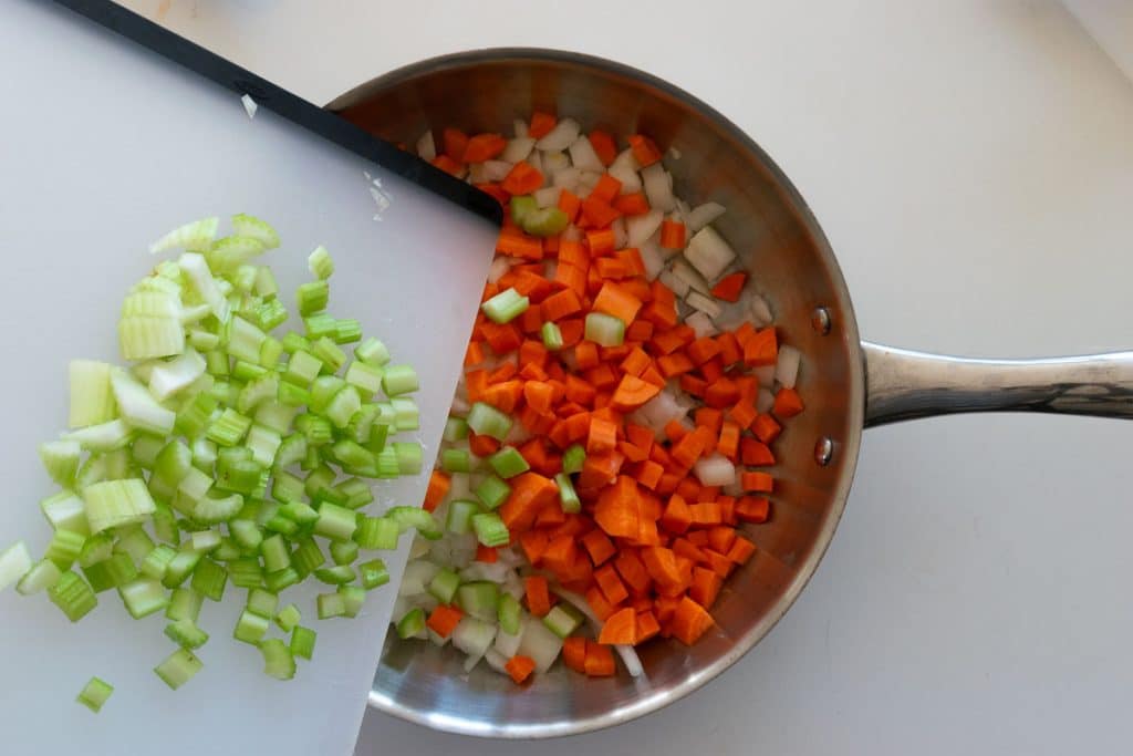 Add celery to skillet.