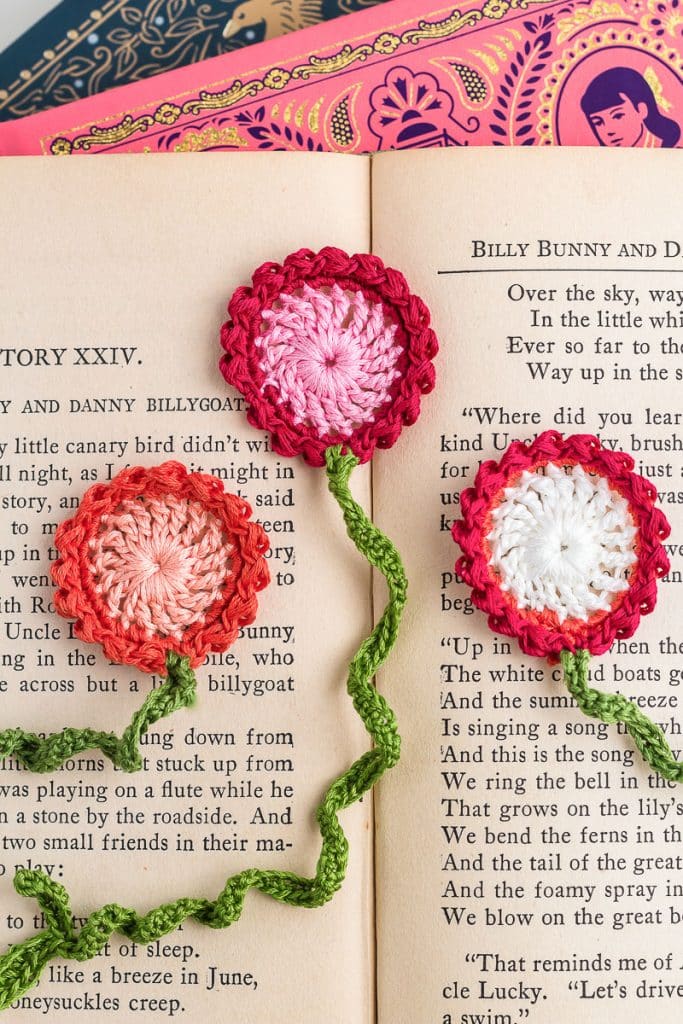 Flower Crochet Bookmarks on a book.