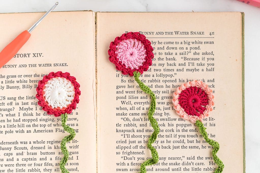 Flower Crochet Bookmarks on a book.