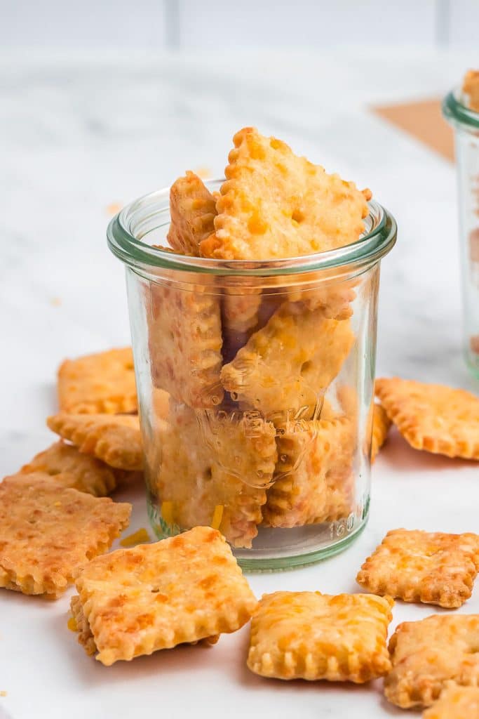 Sourdough Discard Crackers in a glass cup.