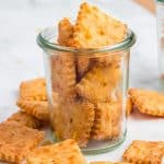 Sourdough Discard Cheese Crackers in a glass jar.
