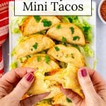 Hands holding air fried mini tacos.