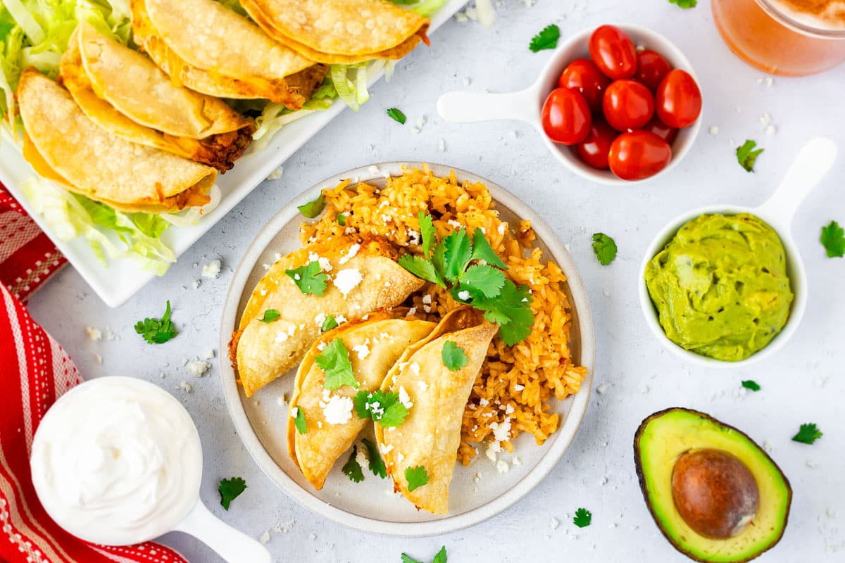Air Fryer mini tacos with rice and guacamole.