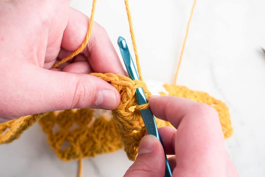 Crochet border of dishcloth.