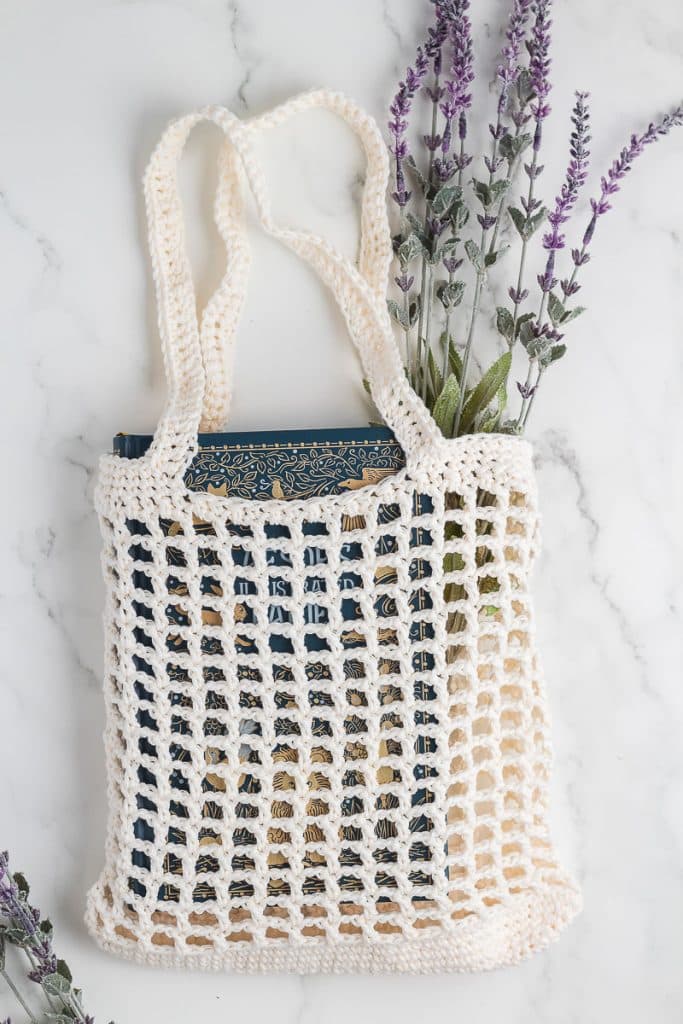 market bag with lavender and a book.