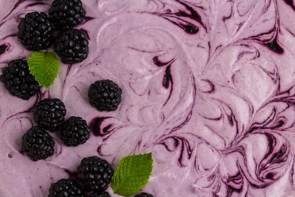 close-up of swirls on blackberry tart.