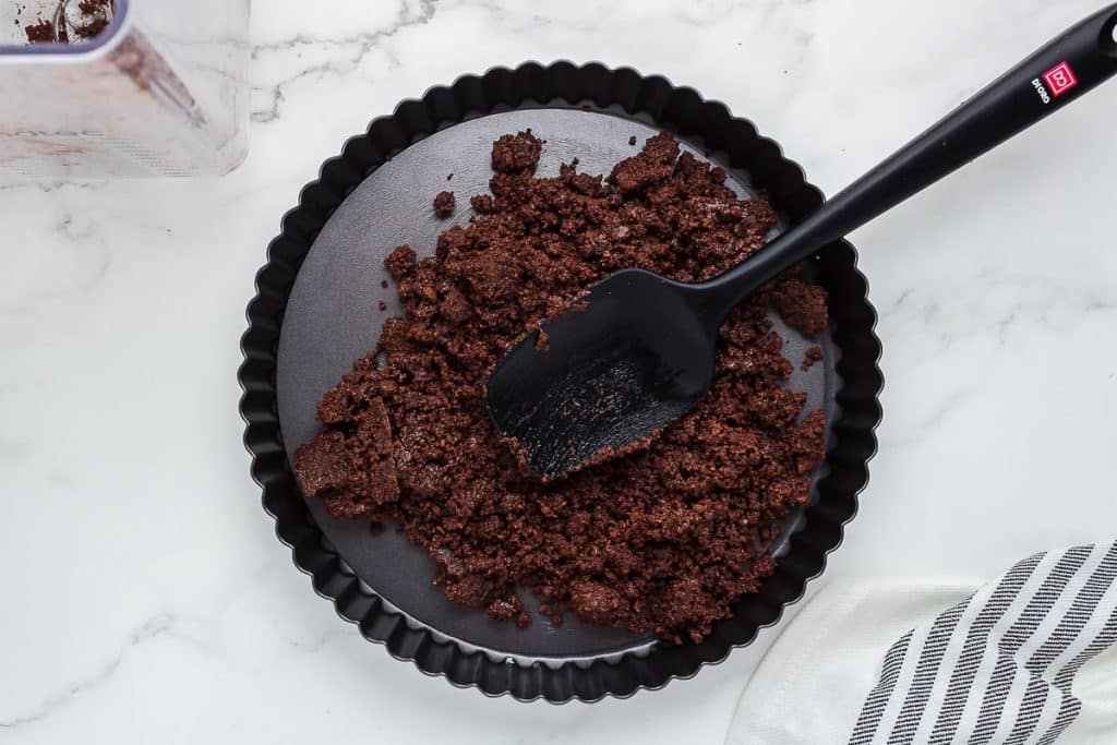 chocolate crust in tart pan.