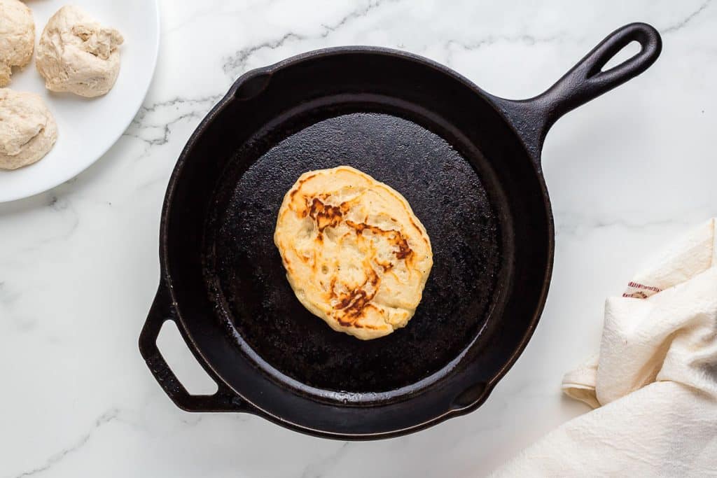 Flatbread in cast iron skillet.