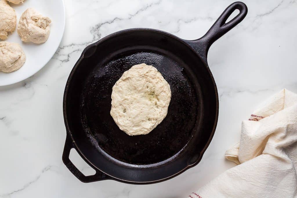 Flatbread in cast iron skillet.