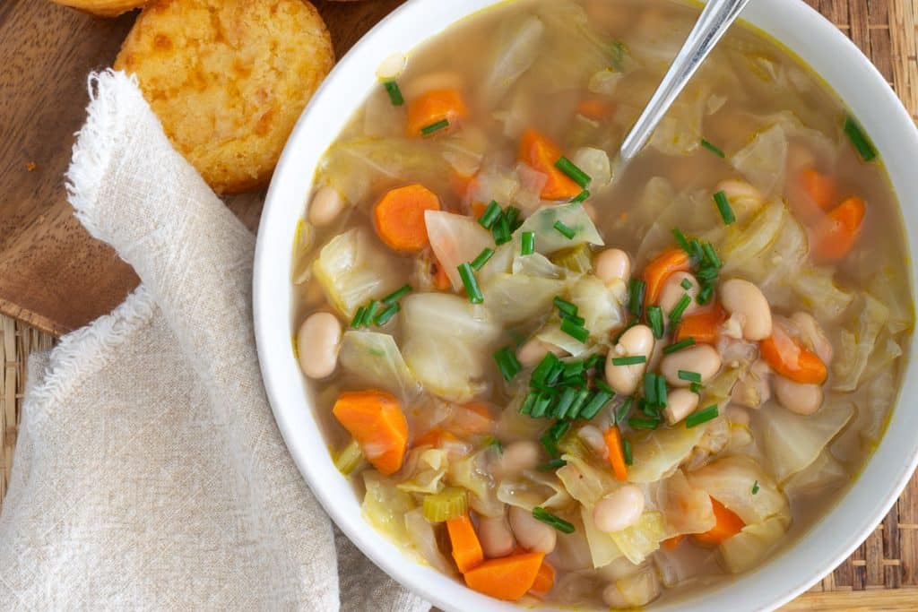 Overhead shot of white bean and cabbage soup.