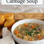 White Bean and Cabbage Soup in a white bowl.