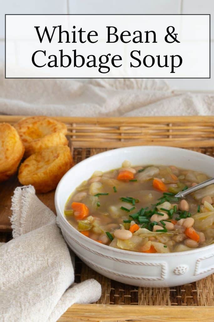 White Bean and Cabbage Soup in a white bowl.