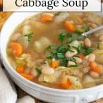 White Bean and Cabbage Soup in a white bowl.