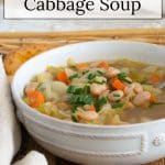 White Bean and Cabbage Soup in a white bowl.