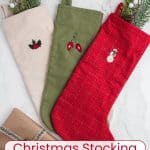 Three embroidered Christmas stockings.