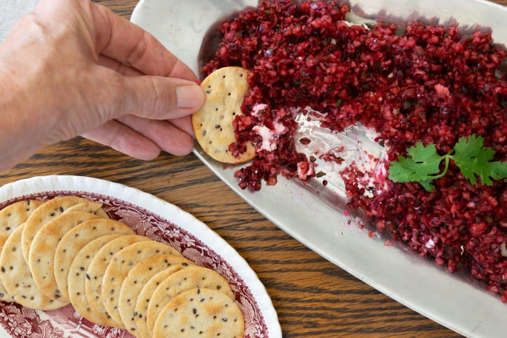 Cranberry Jalapeno Dip on a silver tray.