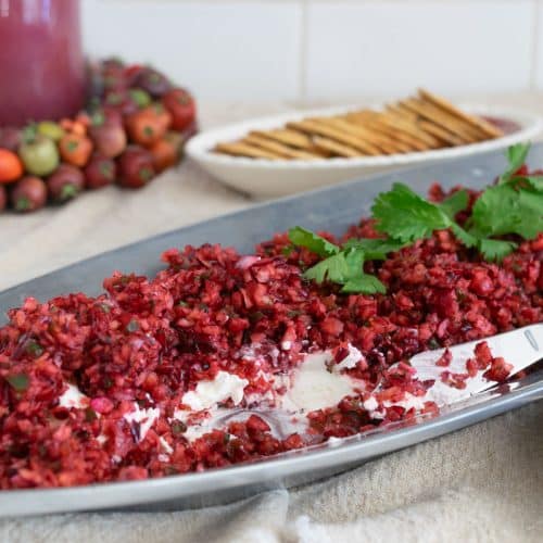 cranberry Jalapeno dip on a silver tray.