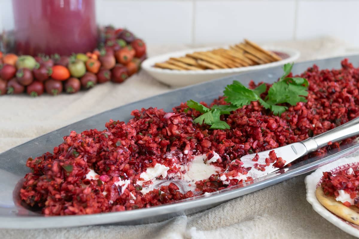 cranberry Jalapeno dip on a silver tray.