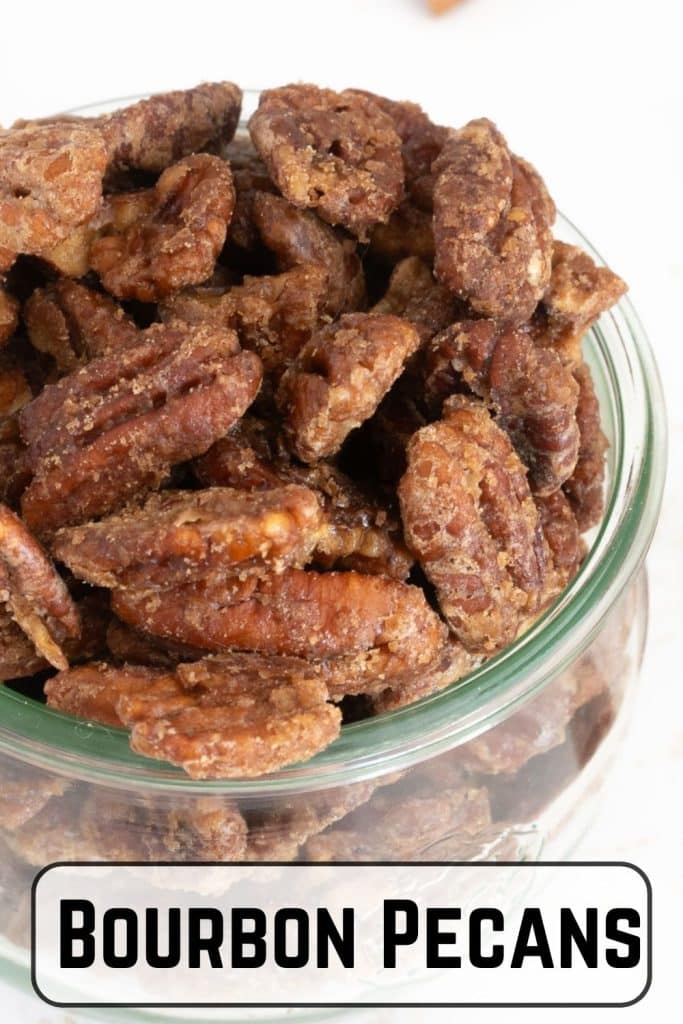 Bourbon pecans in a glass jar.