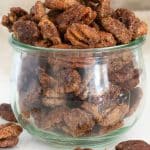 Bourbon pecans in a glass jar.