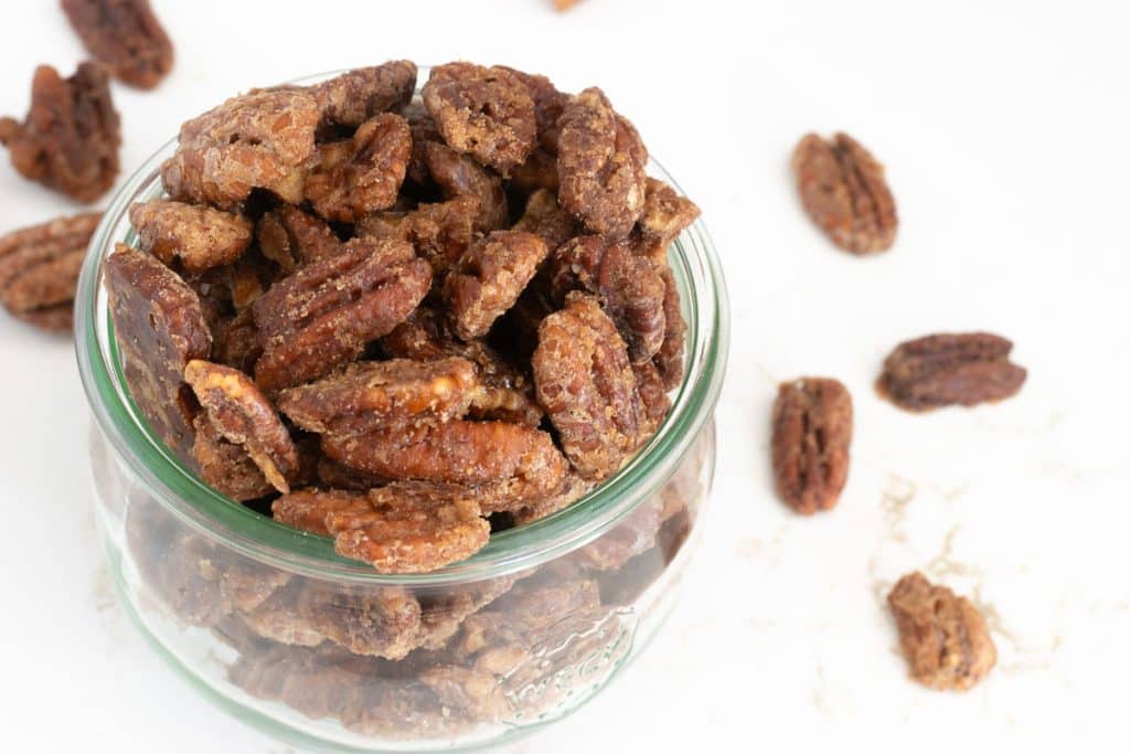 Bourbon pecans in a glass jar.