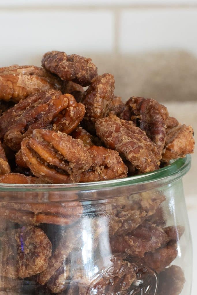 Bourbon pecans in a glass jar.