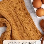 Cable-edged knit dishcloth.