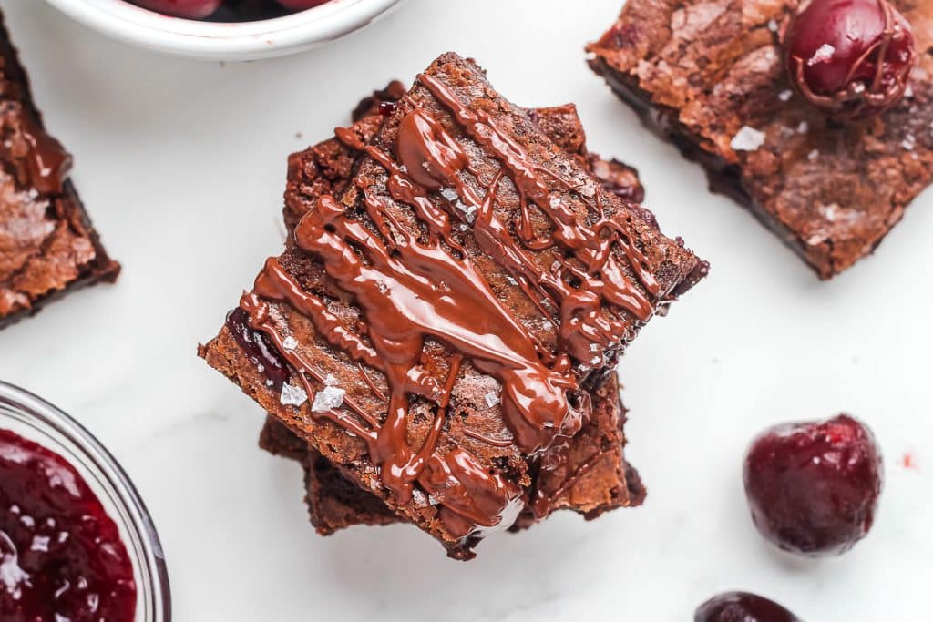 Cherry Chocolate Brownies with sea salt and chocolate sauce.