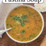 Italian Pastina Soup in a white bowl.