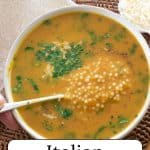 Italian Pastina Soup in a white bowl.