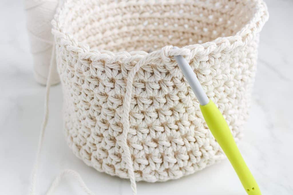 Crocheting edge of Easter basked.