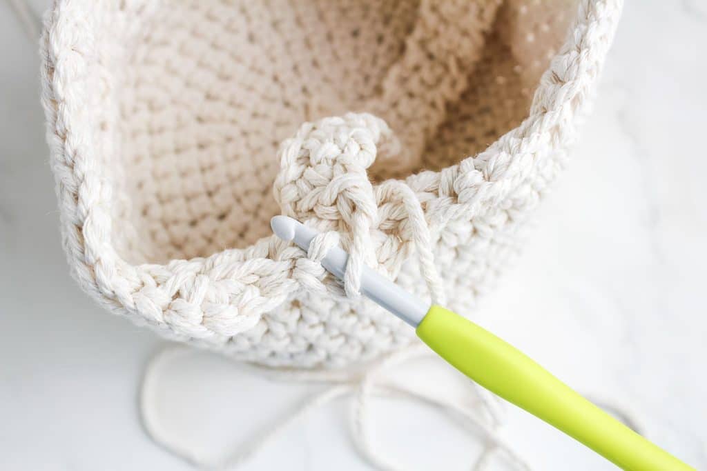 Attaching crocheted handle.