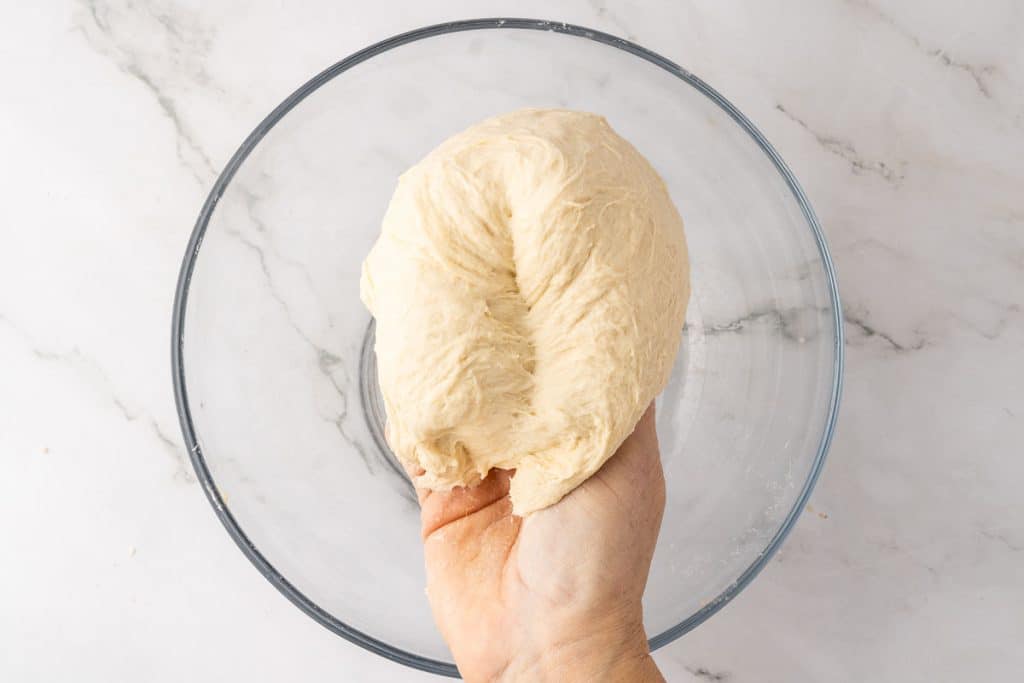 Fold dough in half.