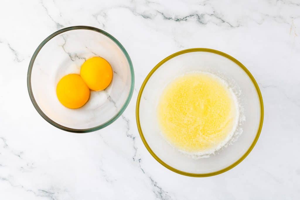 Egg yolks and melted and cooled butter.