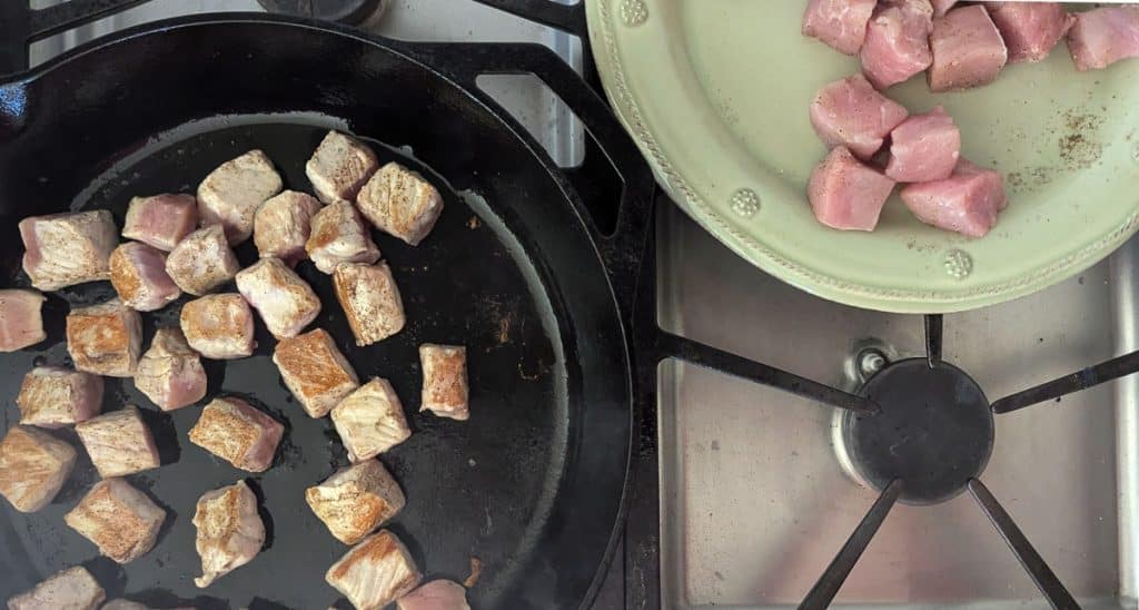 searing pork.