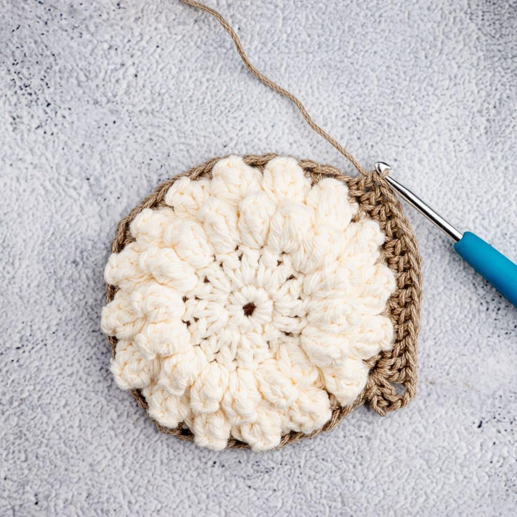 Crocheting granny square.