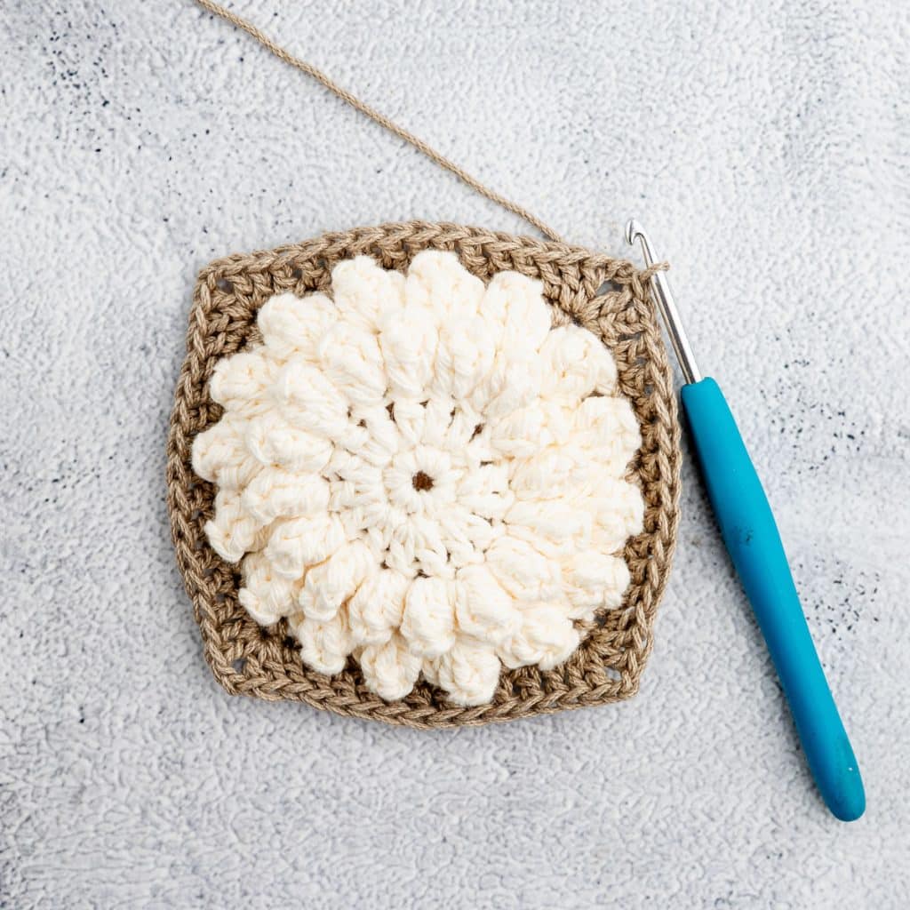 Crocheting granny square.