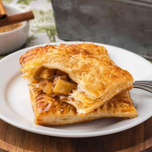 Inside of apple puff pastry hand pie.