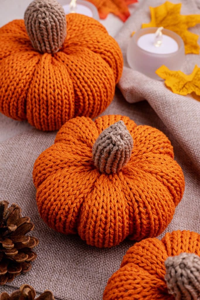 Three knit pumpkins.