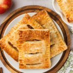 apple puff pastry hand pie on a plate.