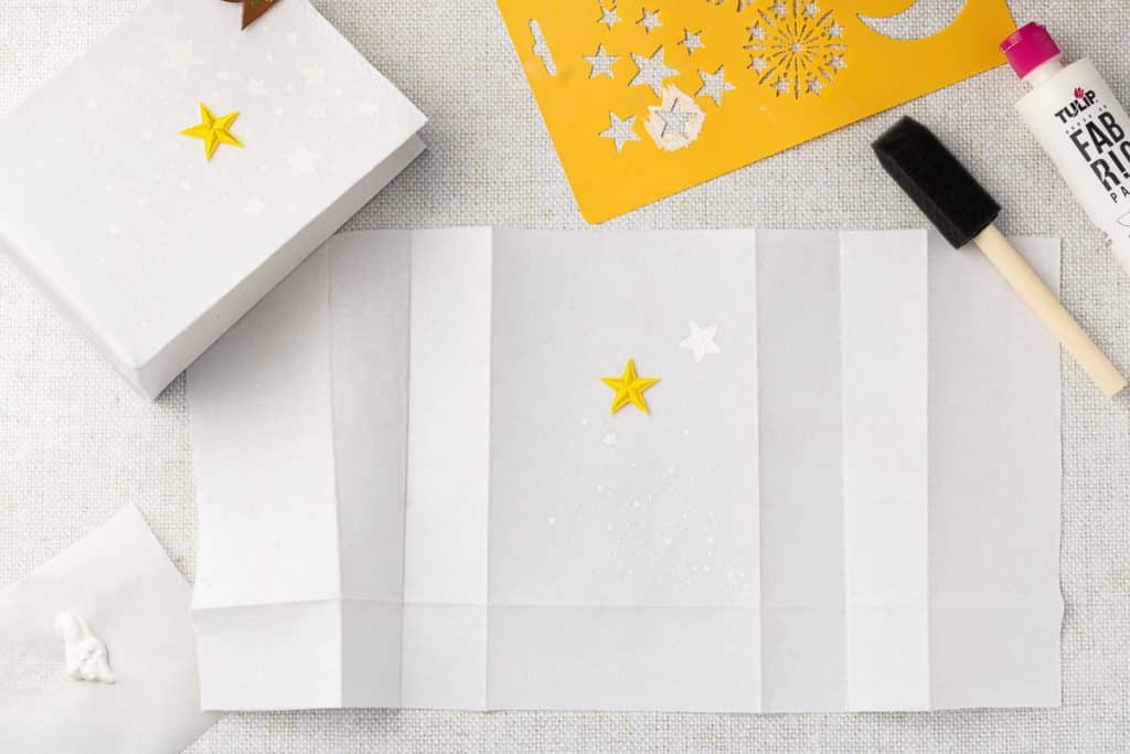 Stars painted on bag.