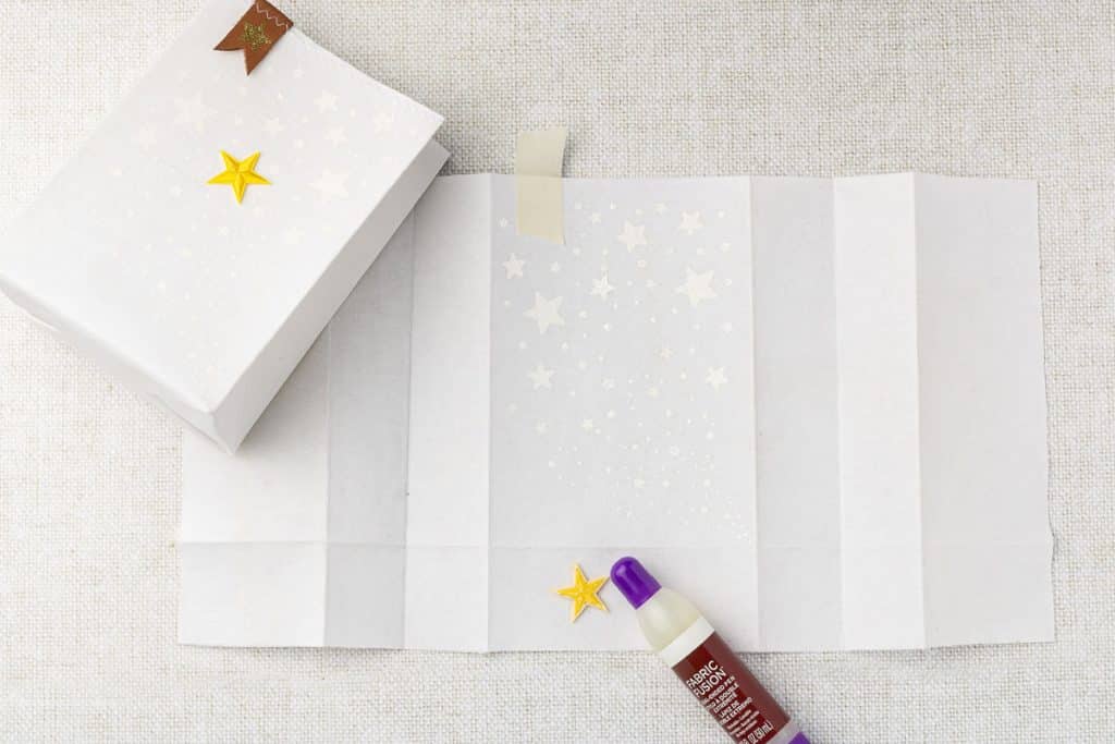 Gluing star patch on.