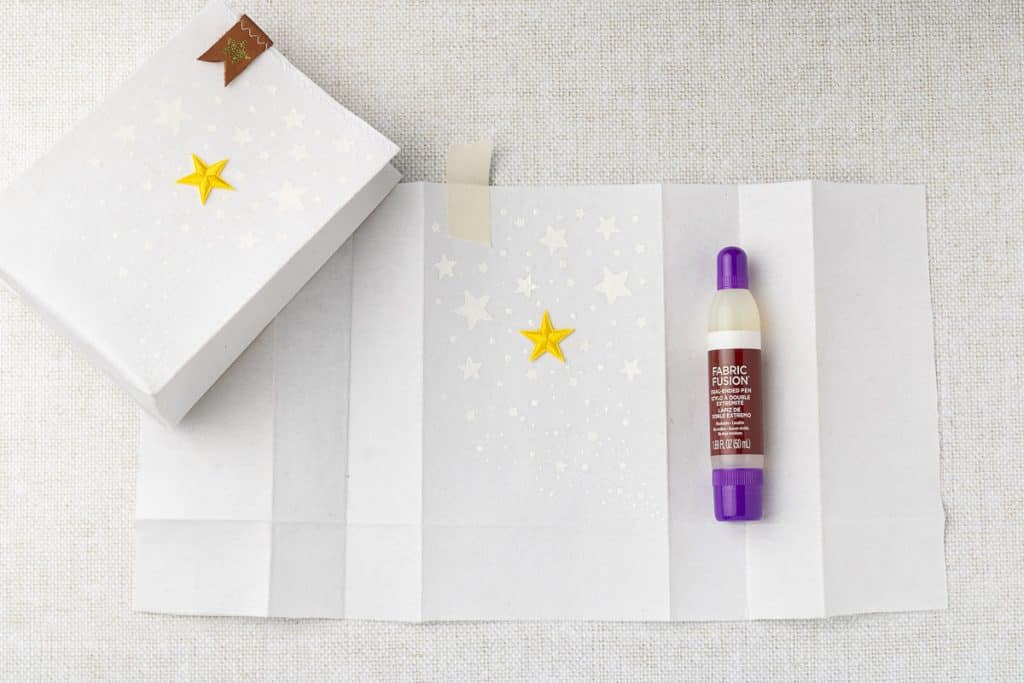 Yellow star glued on.