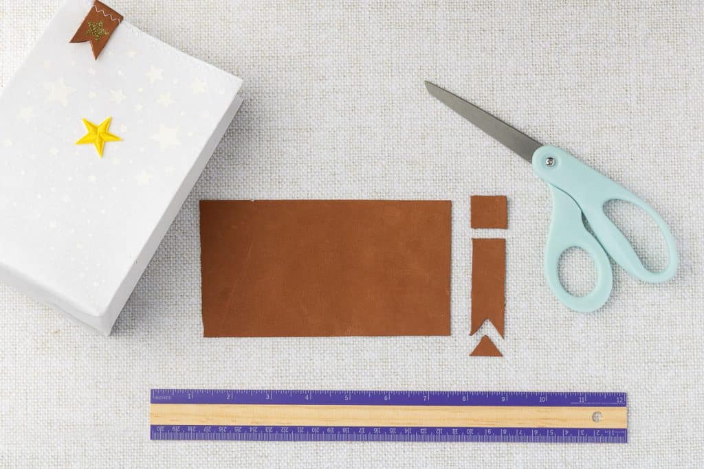 Cutting leather strip.